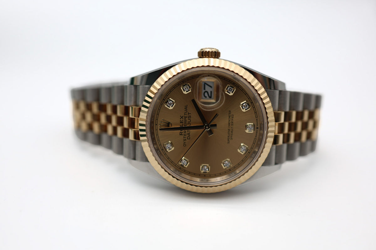 Rolex Datejust Two-Toned YellowGold fluted bezel 36mm jubilee bracelet