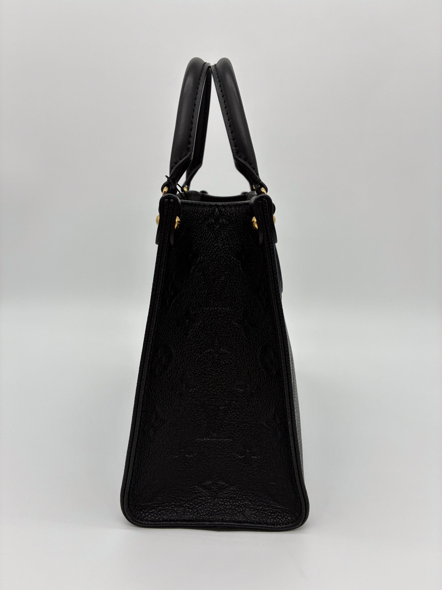 Louis Vuitton OnTheGo PM Tote Crafted in Black Monogram Empreinte Leather