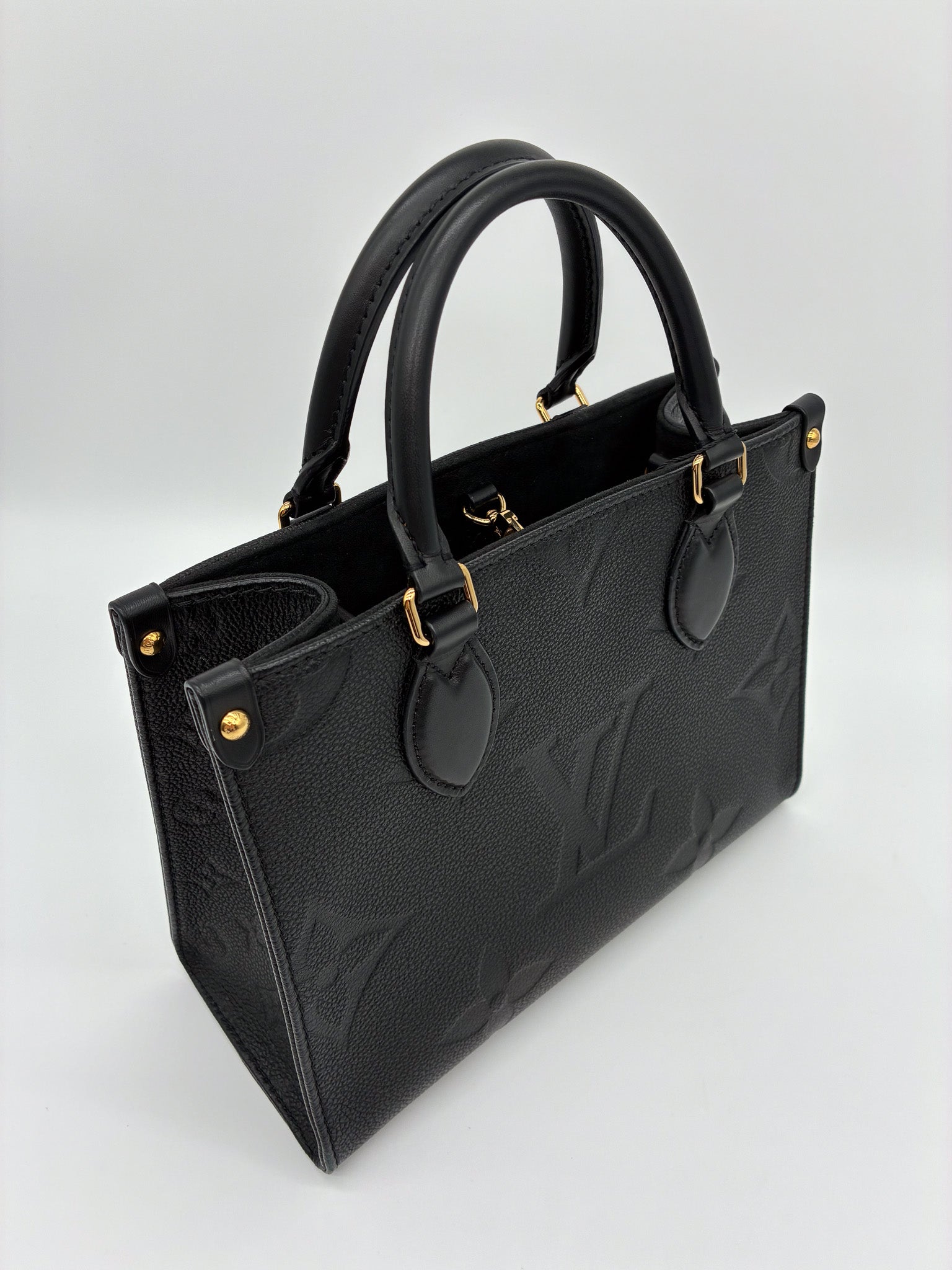 Louis Vuitton OnTheGo PM Tote Crafted in Black Monogram Empreinte Leather
