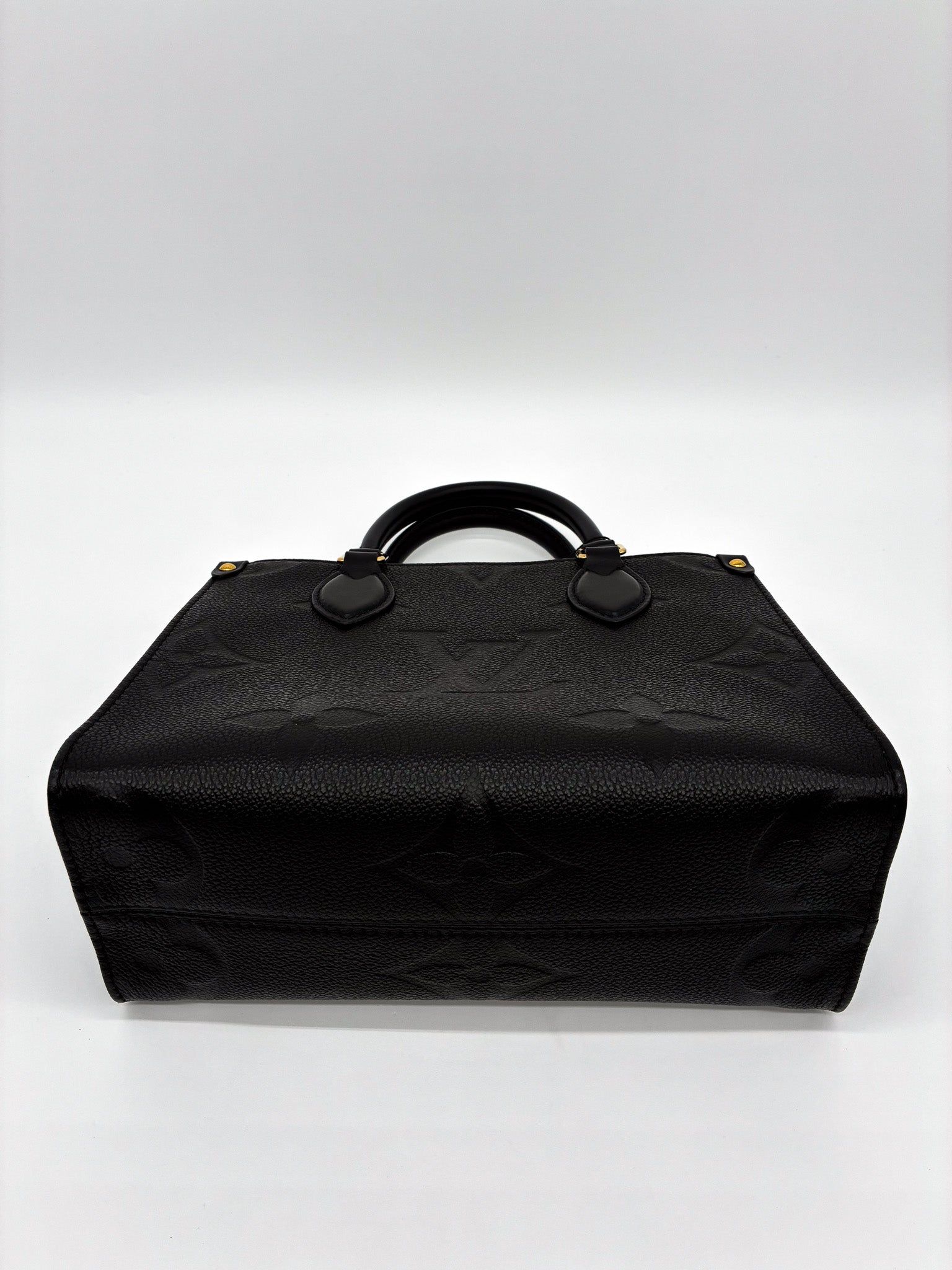 Louis Vuitton OnTheGo PM Tote Crafted in Black Monogram Empreinte Leather