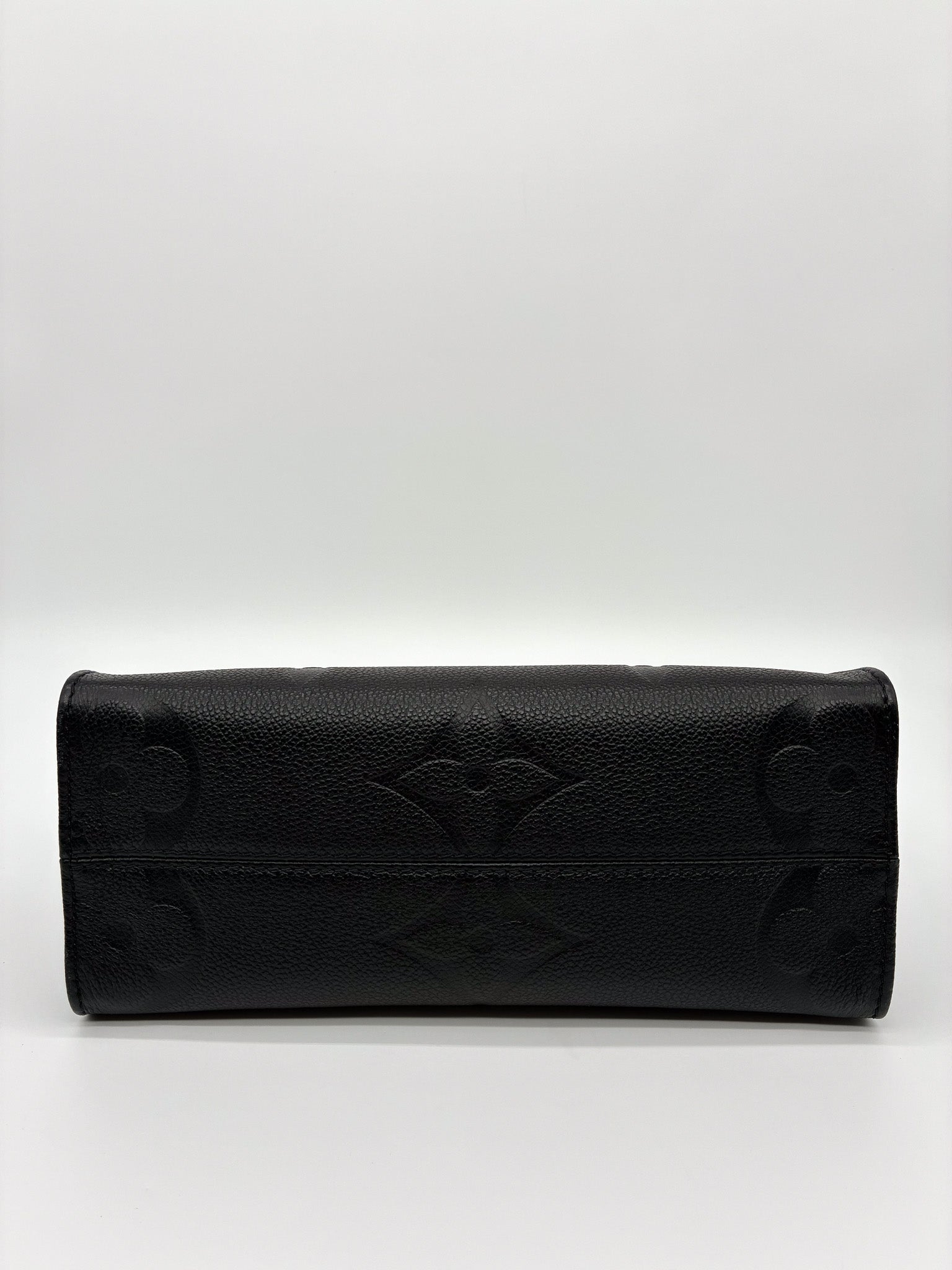 Louis Vuitton OnTheGo PM Tote Crafted in Black Monogram Empreinte Leather